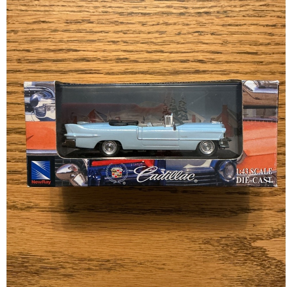 NewRay Cadillac 1:43 Scale Die-Cast Model Car Light Blue Convertible SS-48387